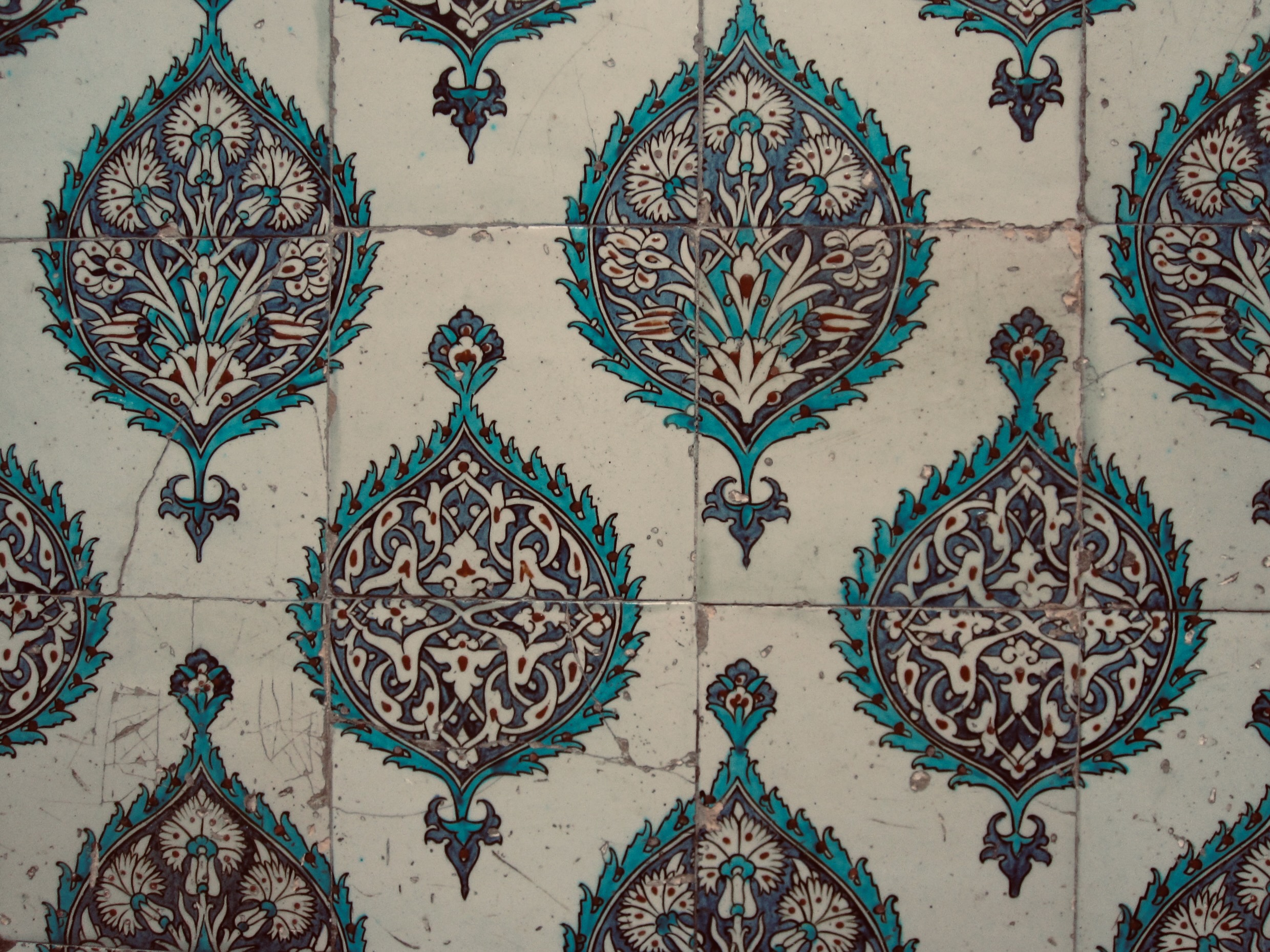 A second Iznik tile pattern in turquoise and indigo florals — another visual rest.